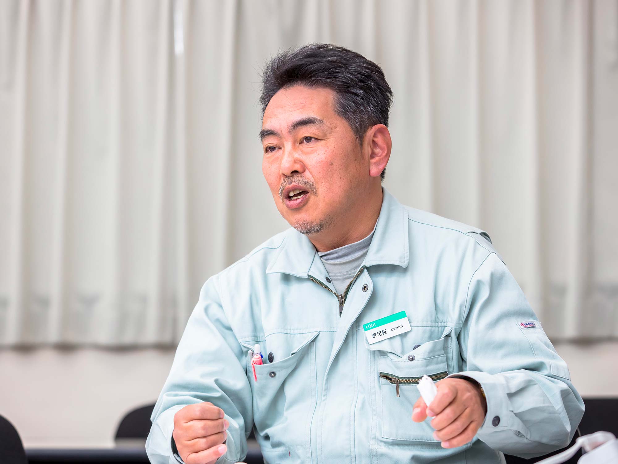 写真05　製造担当　今井一夫（新興窯業）
